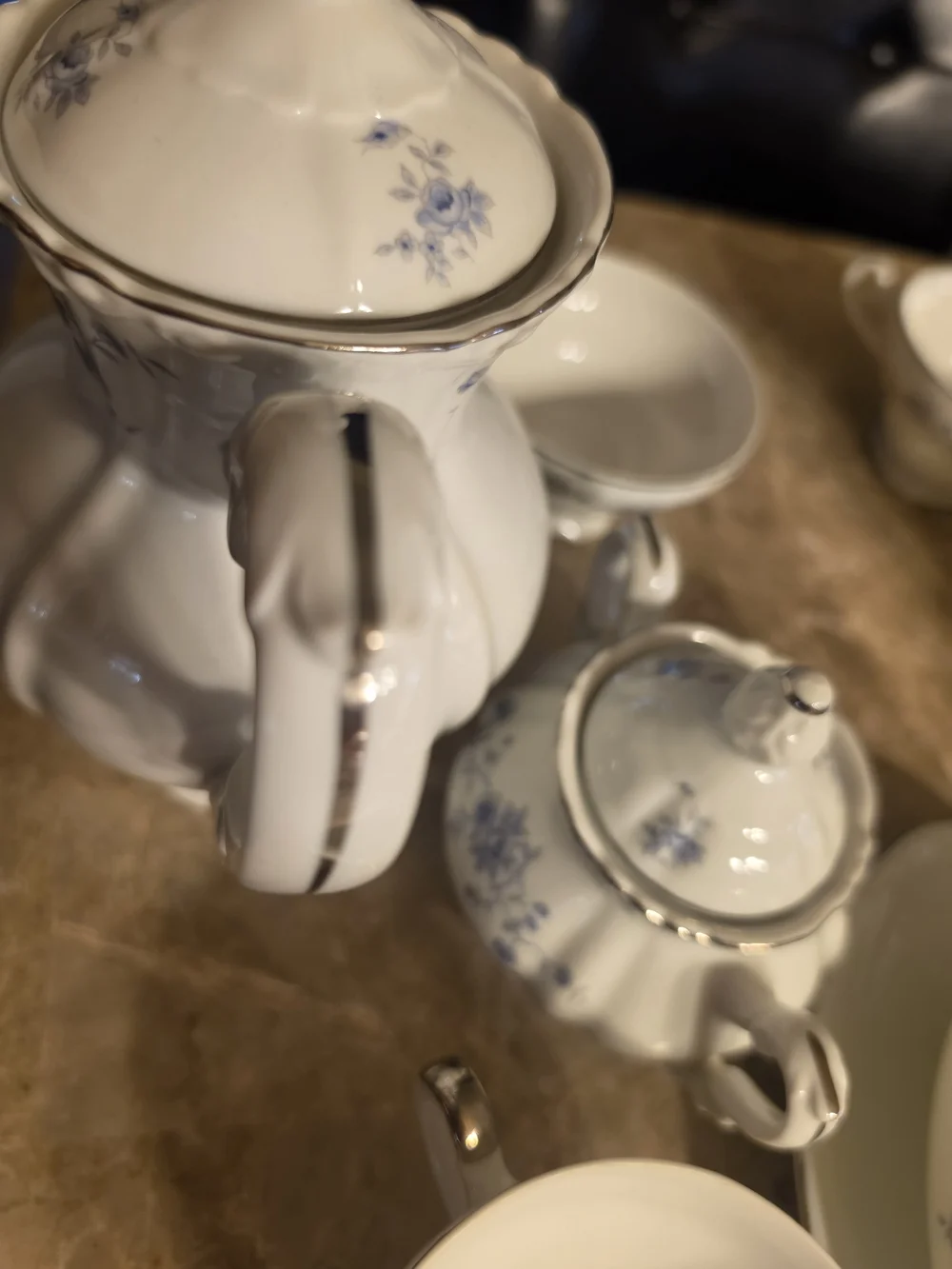 Elegant White Porcelain Tea Set with Blue Floral Accents 20 Pieces